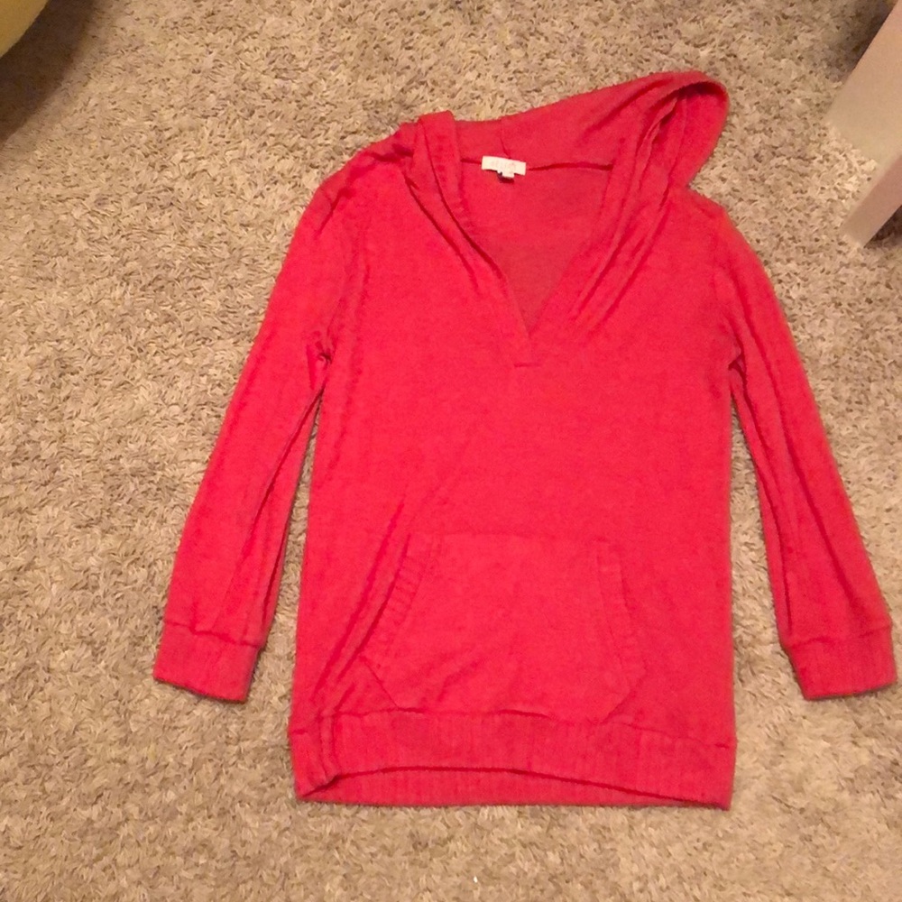 Delia’s red sweatshirt